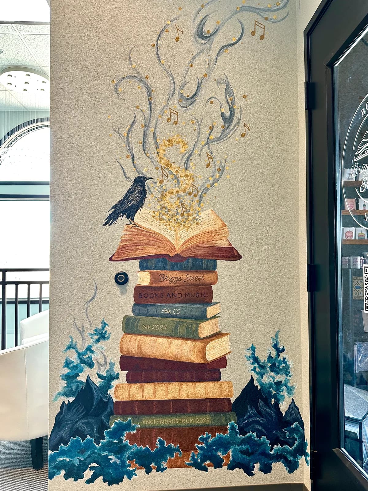 A black raven perches atop a tall stack of stacked books, releasing golden light and musical notes, surrounded by blue forest foliage.