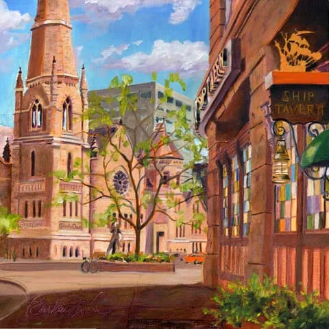 A warm-toned acrylic painting of a Boulder downtown street with historic red-brick buildings and a prominent church steeple.