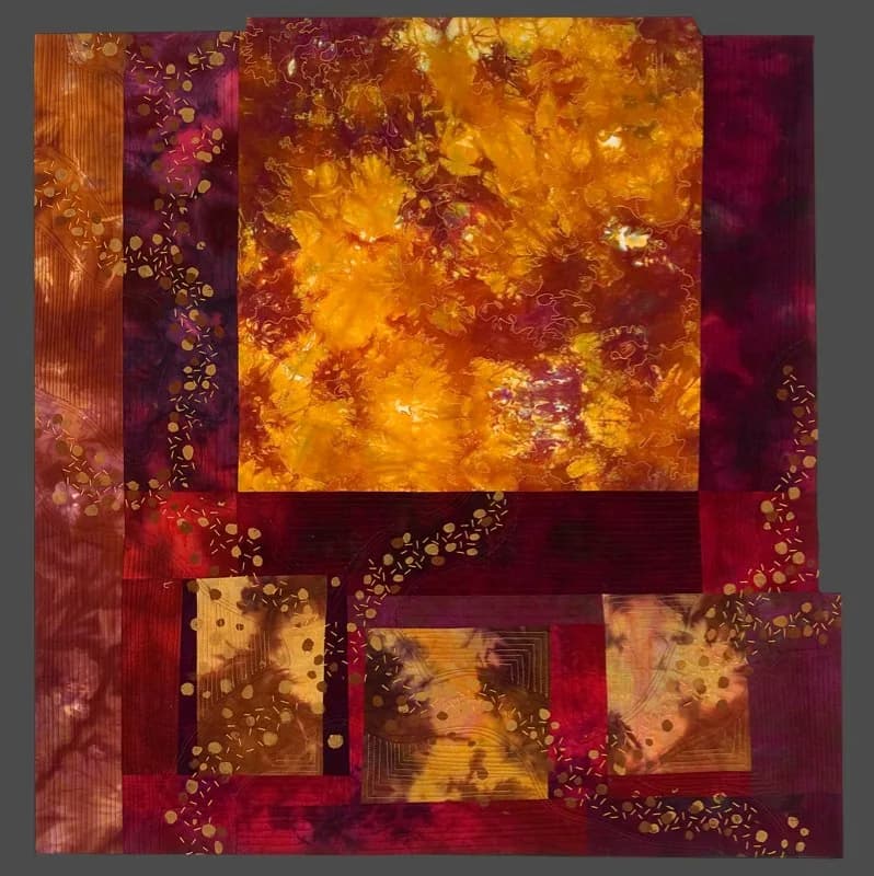 Abstract mixed-media composition with layered gold and crimson tones, textured surfaces, and floating organic elements.