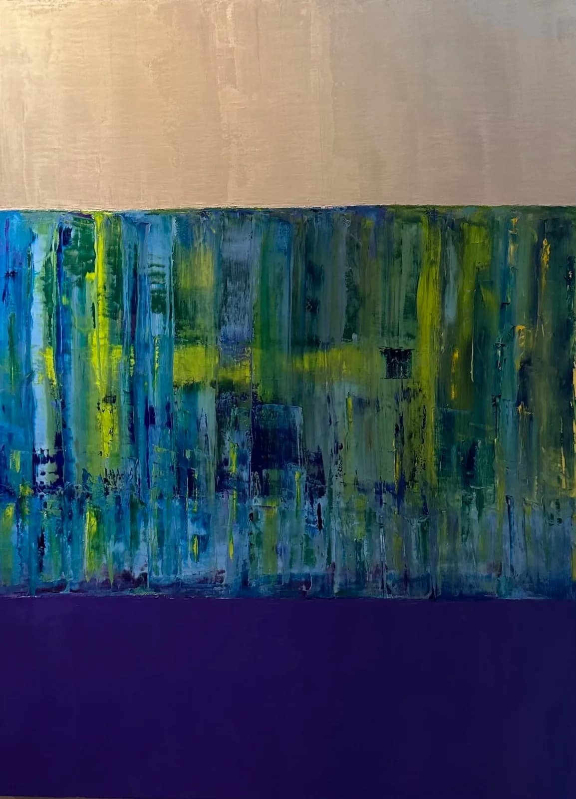 Abstract painting with vertical bands of layered blue, green, and yellow acrylic over a deep plum base.