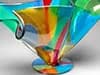 An abstract glass sculptural form with vibrant blue, orange, and green hues in dynamic composition.