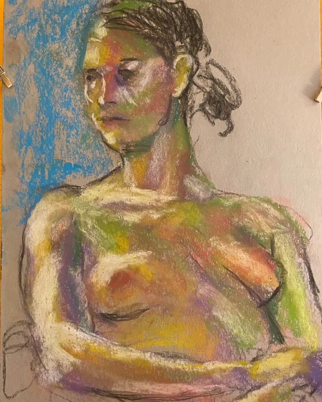Pastel figure study of a female torso and head rendered in expressive yellows, greens, and purples.