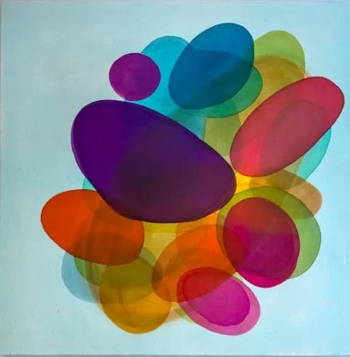 Abstract painting of overlapping translucent circles in vibrant hues on a pale blue ground.