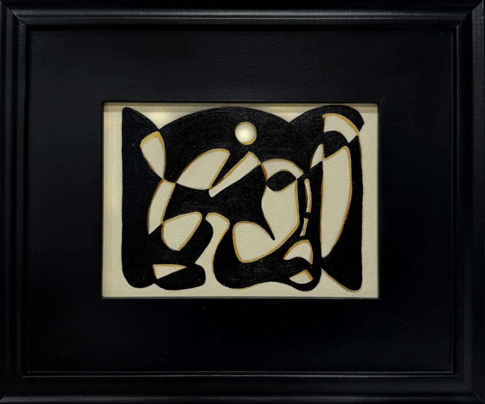 Abstract geometric cutout print in black and cream with interlocking organic and angular forms.