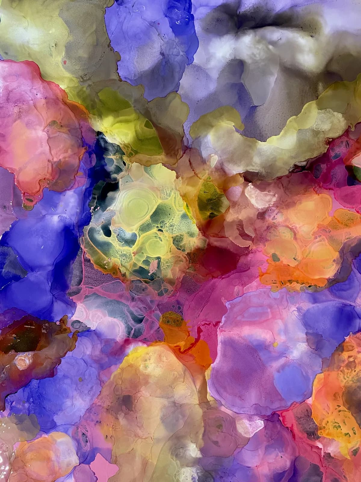 Abstract composition in watercolor with layered translucent washes of blue, pink, yellow, and orange pigments.