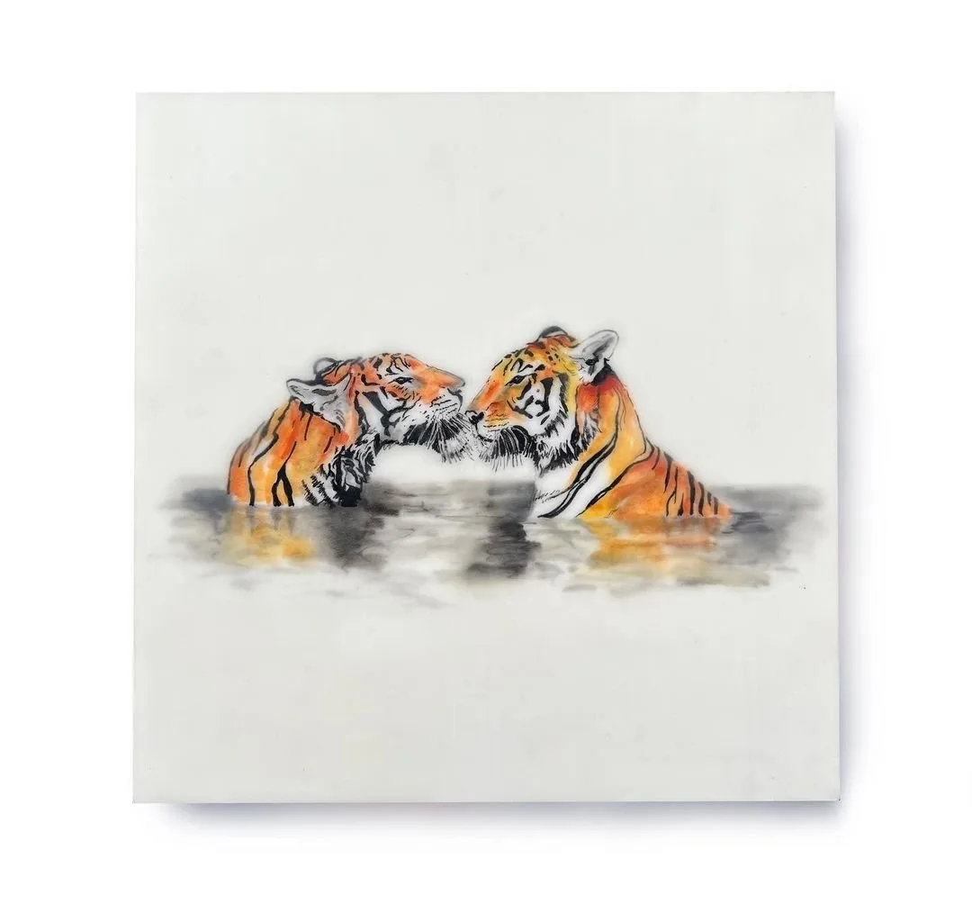 A tiger mother and cub play in shallow water, rendered in detailed pencil and watercolor.