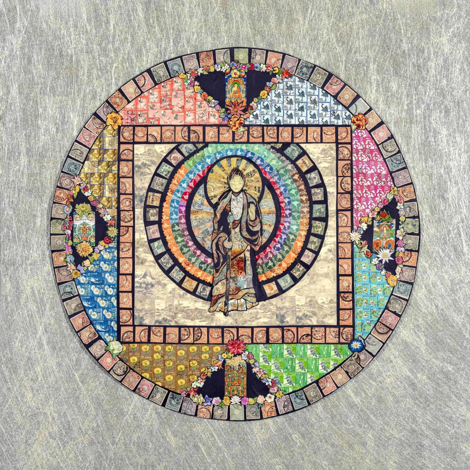 Circular textile collage with Buddhist figure at center surrounded by concentric rings and patterned fabric squares.