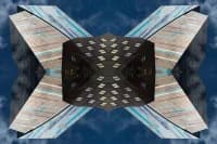 Symmetrical woven textile composition featuring interlocking geometric patterns and contrasting dark and light fibers.