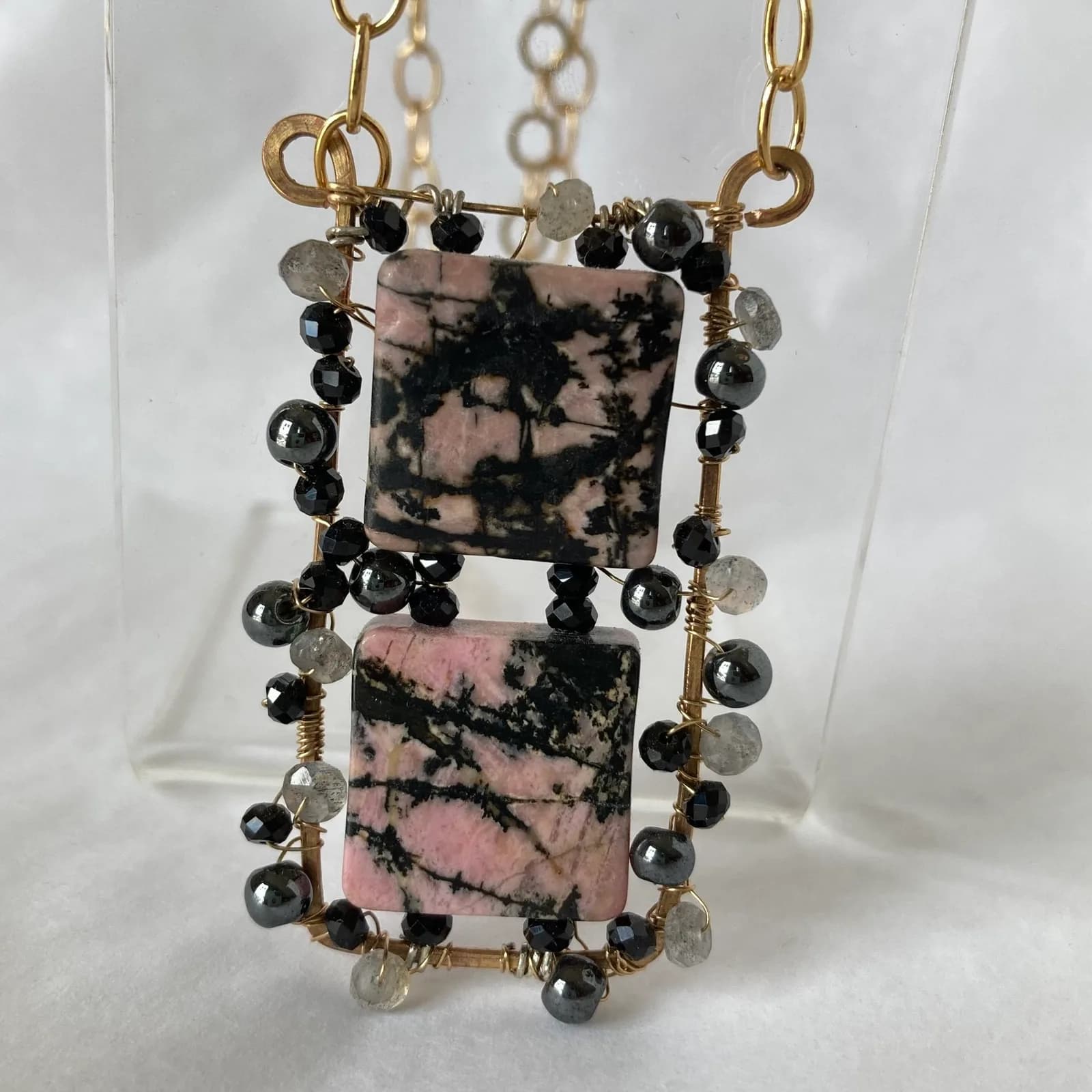 Mixed-metal pendant necklace with tourmalinated quartz tiles, black onyx, and labradorite beads.