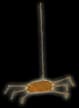 Abstract wooden sculpture with vertical metal rod element and warm earth tones.