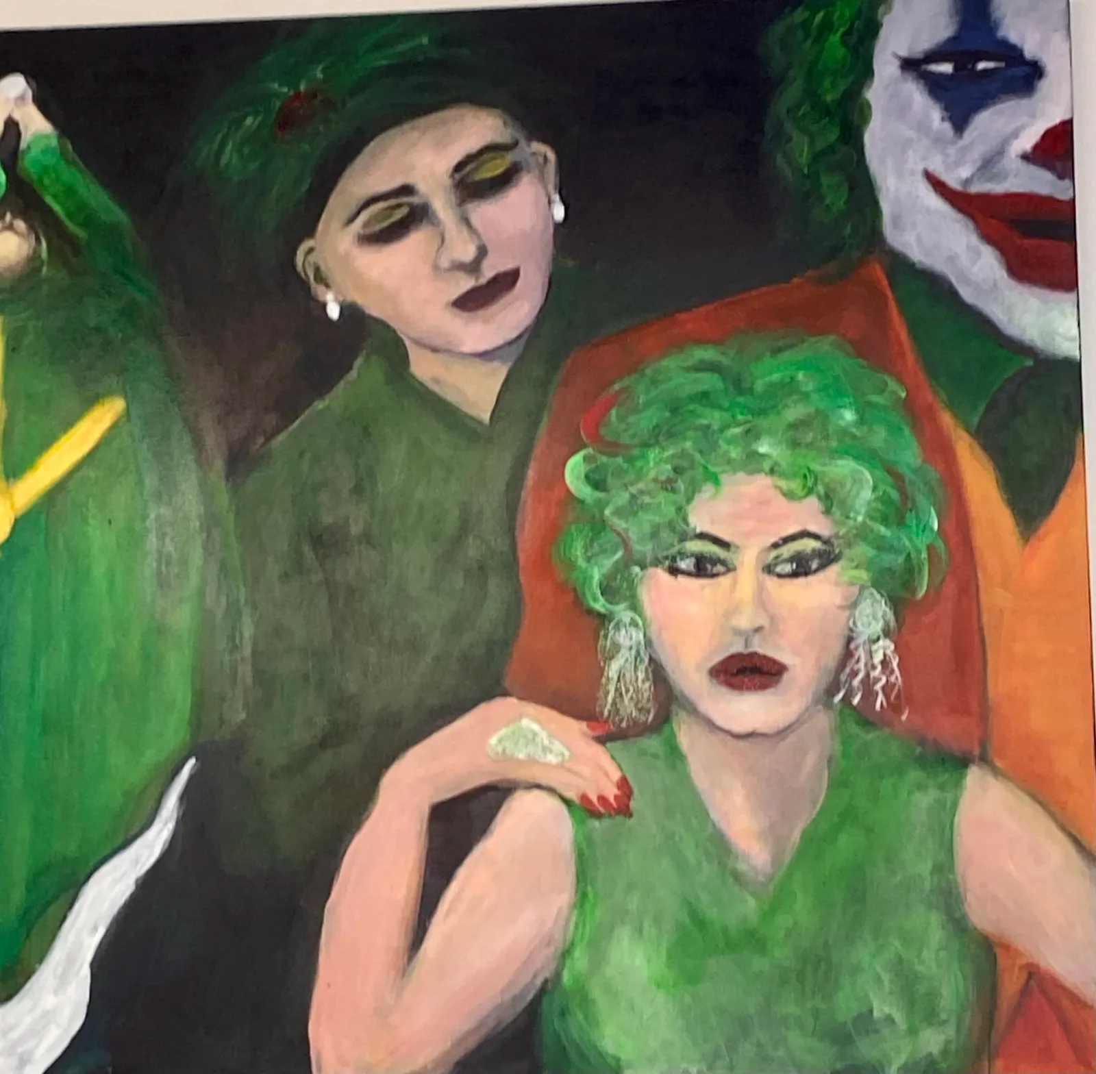 Three stylized figures with green and theatrical makeup rendered in bold acrylic paint.