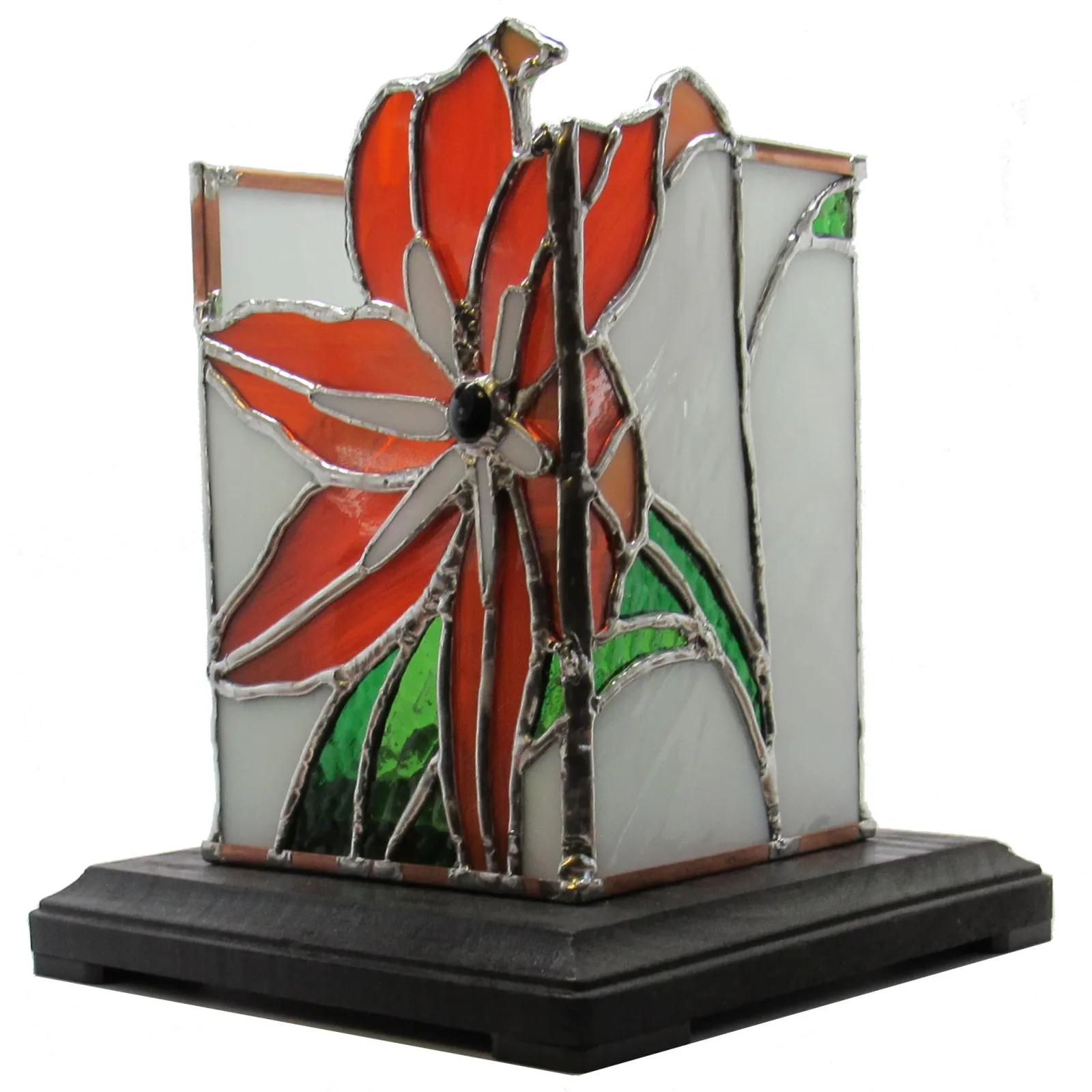 Stained glass flower sculpture with red petals and green leaves mounted on a dark base.