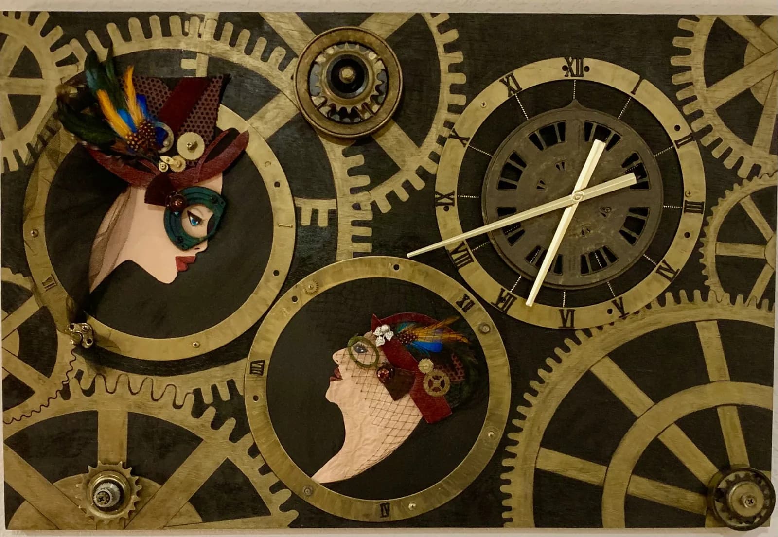 Two steampunk-inspired portrait heads framed within ornate brass gears and a clock face, rendered in mixed media with decorative hats.