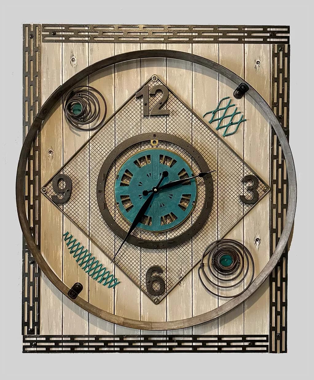 Mixed-media wall clock with geometric diamond and circular frame, wood base, turquoise face, and metal ornamental details.