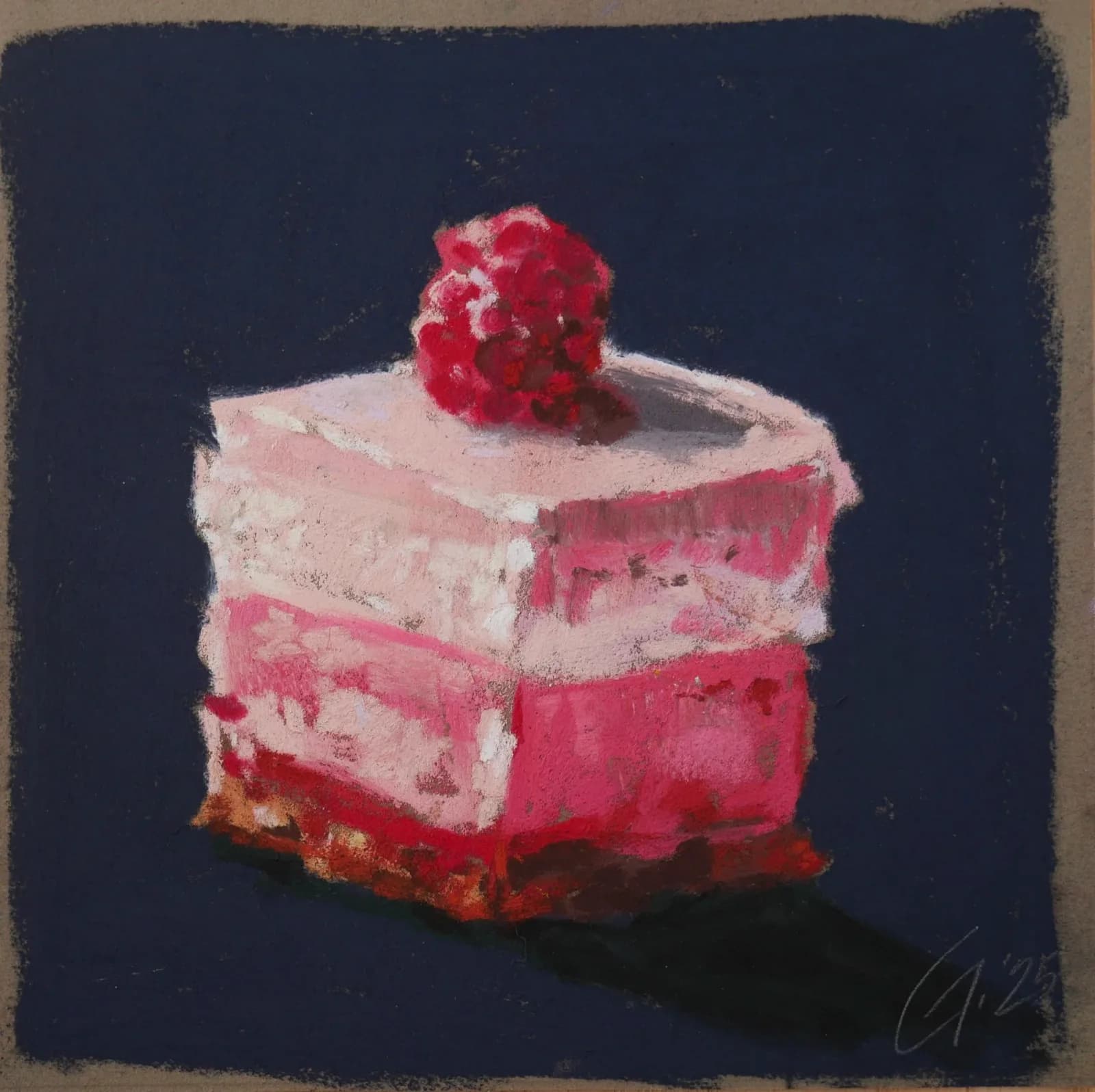 A layered pink cake with a red raspberry on top sits against a dark navy background.