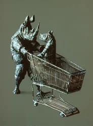 A metallic anthropomorphic figure pushes an oversized shopping cart in this surreal metal sculpture.