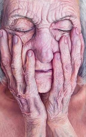 An elderly person's face cradled in weathered hands, rendered in photorealistic color photography with tones of puce, wine berry, and blossom pink.
