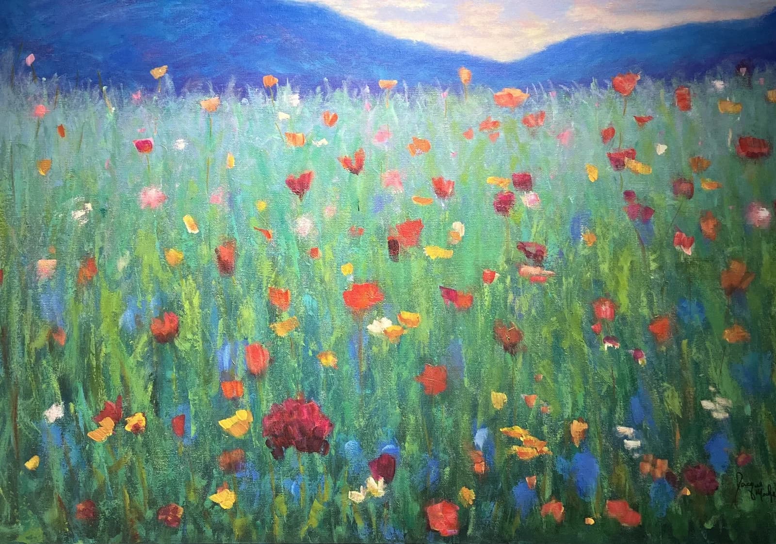 A wildflower meadow in shades of red, orange, and yellow blooms beneath blue mountains in oil.