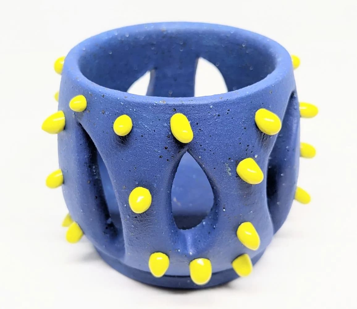Featured artwork by Julie BaBulie Ceramics