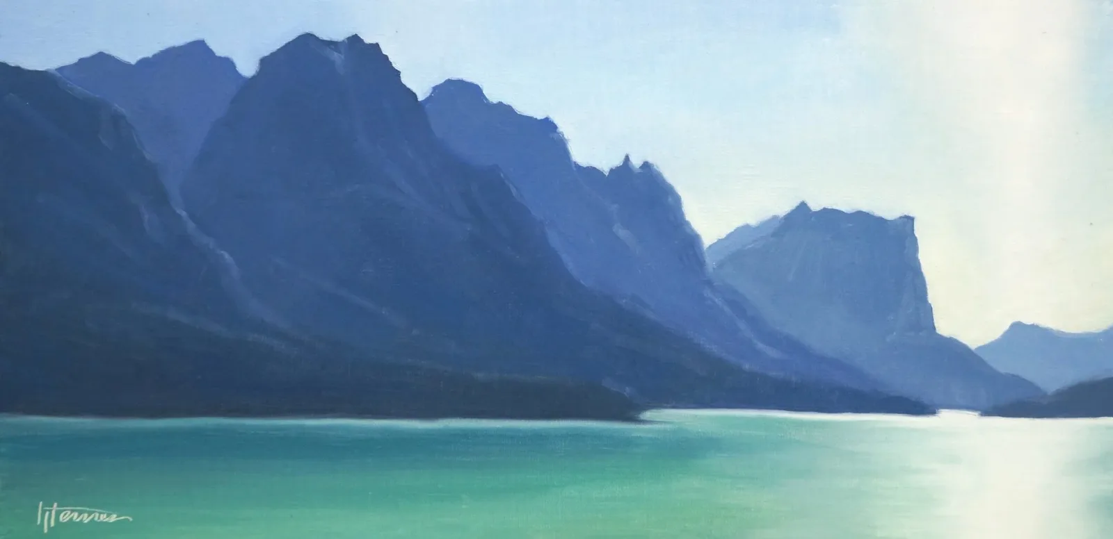Alpine landscape with steep blue mountains reflected in turquoise glacial water under soft light.
