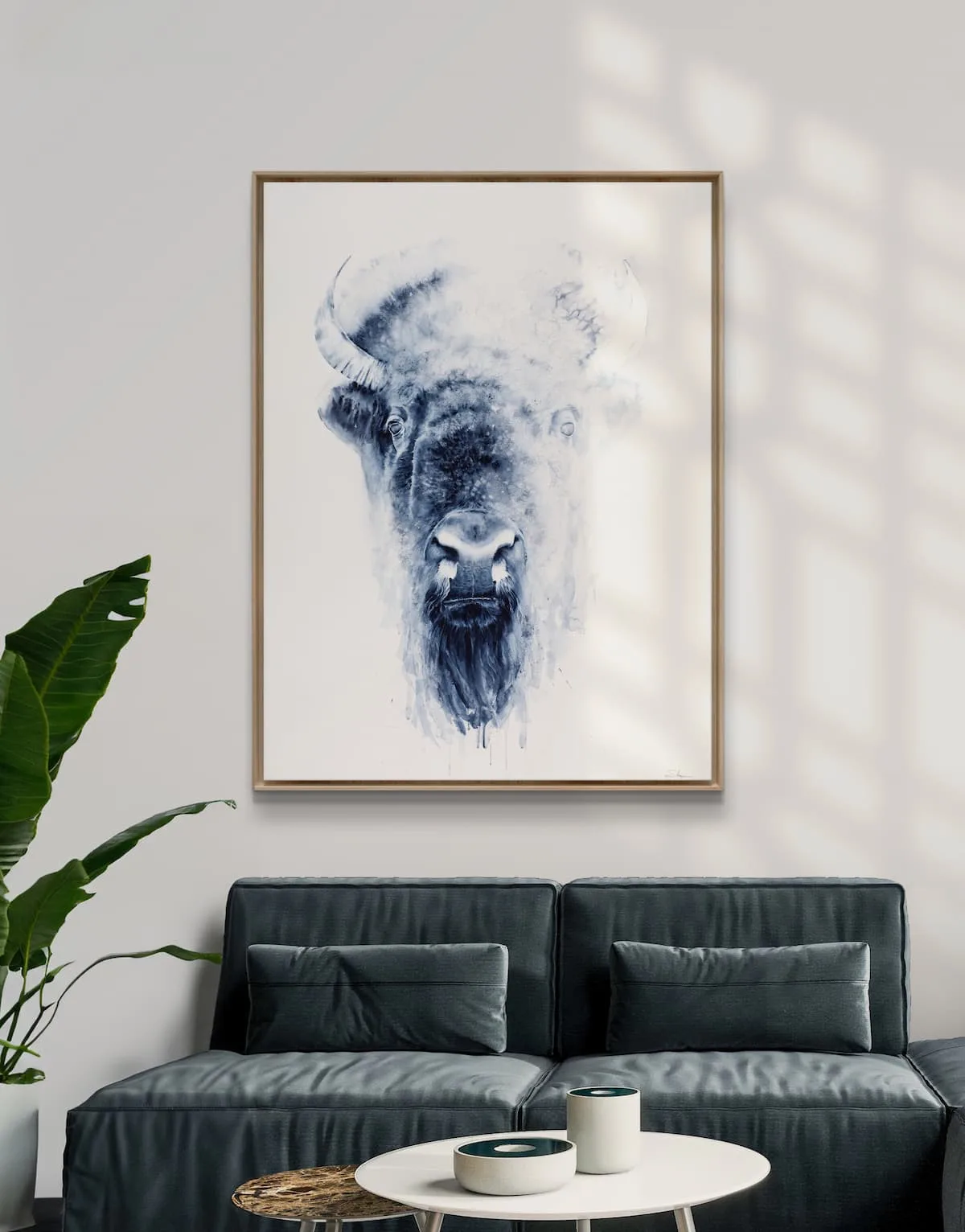 Blue-ink portrait of a bison head rendered in monochromatic wash technique.